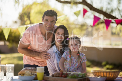 Happy family enjoying together on picnic