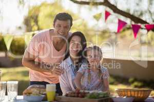 Happy family enjoying together on picnic