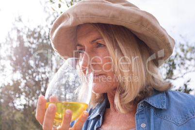 Woman drinking a glass of wine