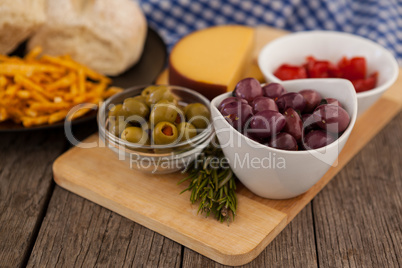 Olives and vegetable by french fries with bread