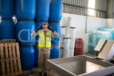 Worker wearing ear muff