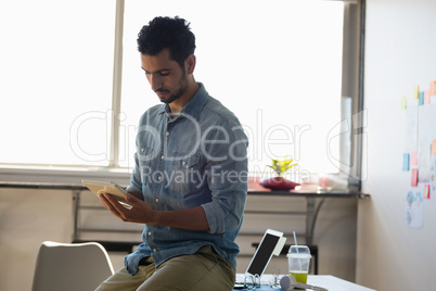 Man using tablet in office