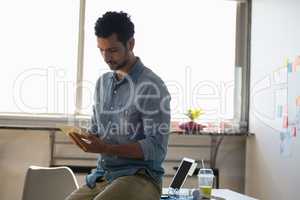 Man using tablet in office