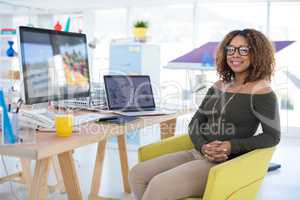 Female graphic designer working at desk