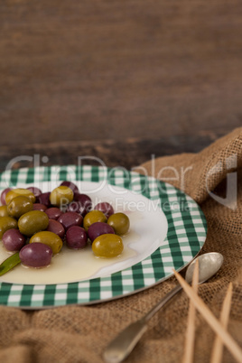 Close up of olives served in plate
