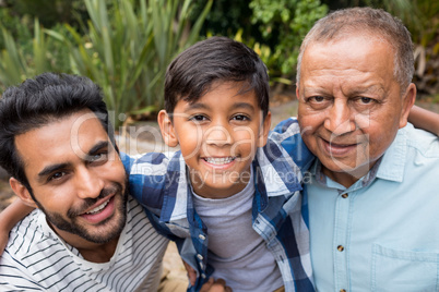 Close up portrait of family at park