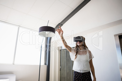 Businesswoman wearing virtual reality simulator