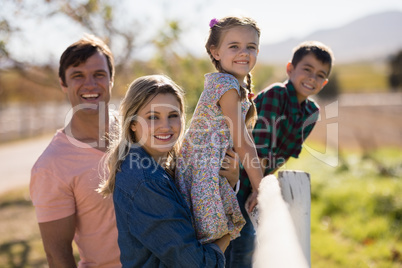 Happy family enjoying in the park on a sunny day