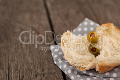 Close up of olives with bread