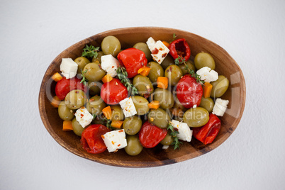Olives with chili pepper and cheese served in bowl