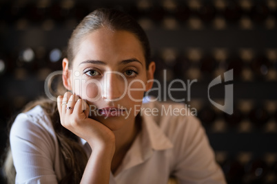 unhappy woman sitting in bar