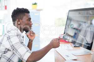 Executive working on computer in office