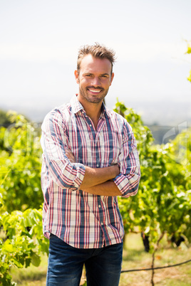 Portrait of young man at vineyard