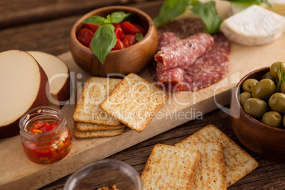 Crackers with meat and olives
