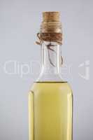 Close up of olive oil bottle with cork