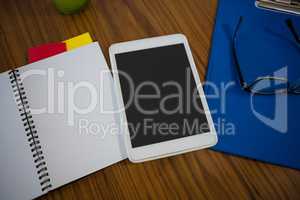 High angle view of tablet on table in office