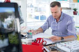 Male executive working at desk