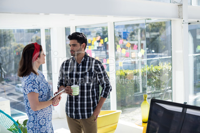 Couple interacting with each other in the office