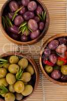 Directly above shot of olives in wooden bowls