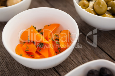 Close up of orange bell pepper slices in bowl