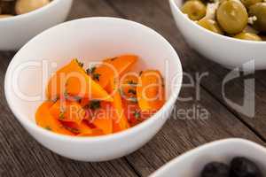 Close up of orange bell pepper slices in bowl