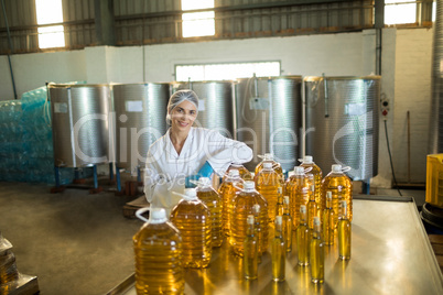 Portrait of female worker sitting at table