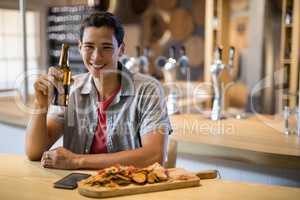 Man having beer in a restaurant