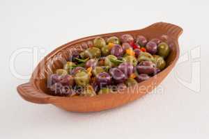 Close up of olives served in bowl