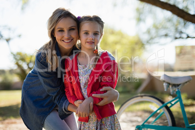 Mother and daughter enjoying together in the park