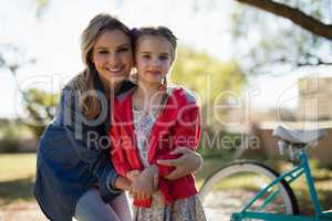 Mother and daughter enjoying together in the park