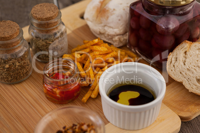 Close up of food with jar on cutting boards