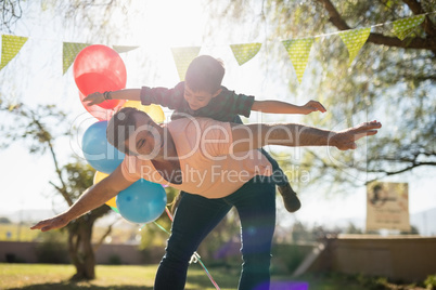 Father and son enjoying together in the park