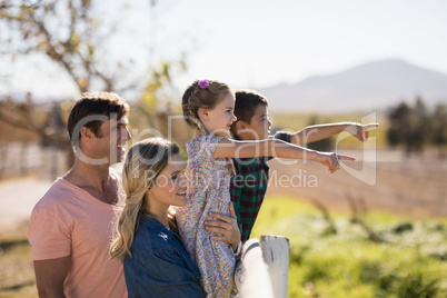 Happy family enjoying in the park on a sunny day