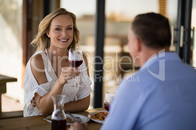 Couple having meal in restaurant