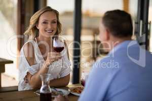 Couple having meal in restaurant