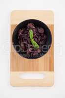 Directly above shot of dried olives on cutting board