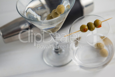 High angle view of vodka martini with cocktail shaker