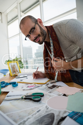 Male designer drawing sketch at studio