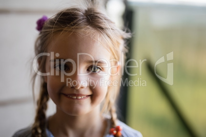 Smiling cute girl looking at camera