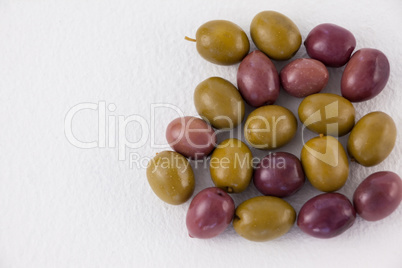 Overhead view of green and brown olives