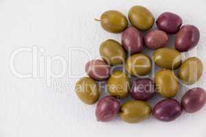 Overhead view of green and brown olives