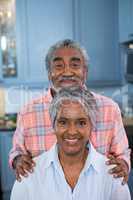 Portrait of smiling couple at home