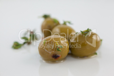 Close up of olives with thyme
