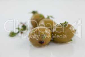 Close up of olives with thyme