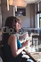 Couple having breakfast in the kitchen