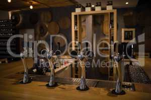 Close-up of beer pump at counter