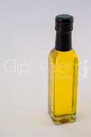 High angle view yellow oil bottle against wall