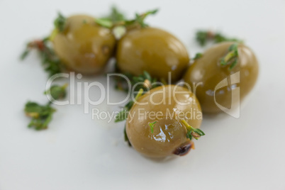 Close up of olives with herbs