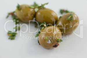 Close up of olives with herbs