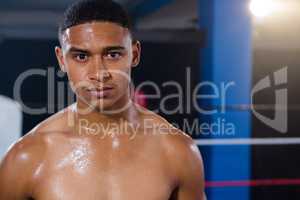Portrait of confident young male boxer